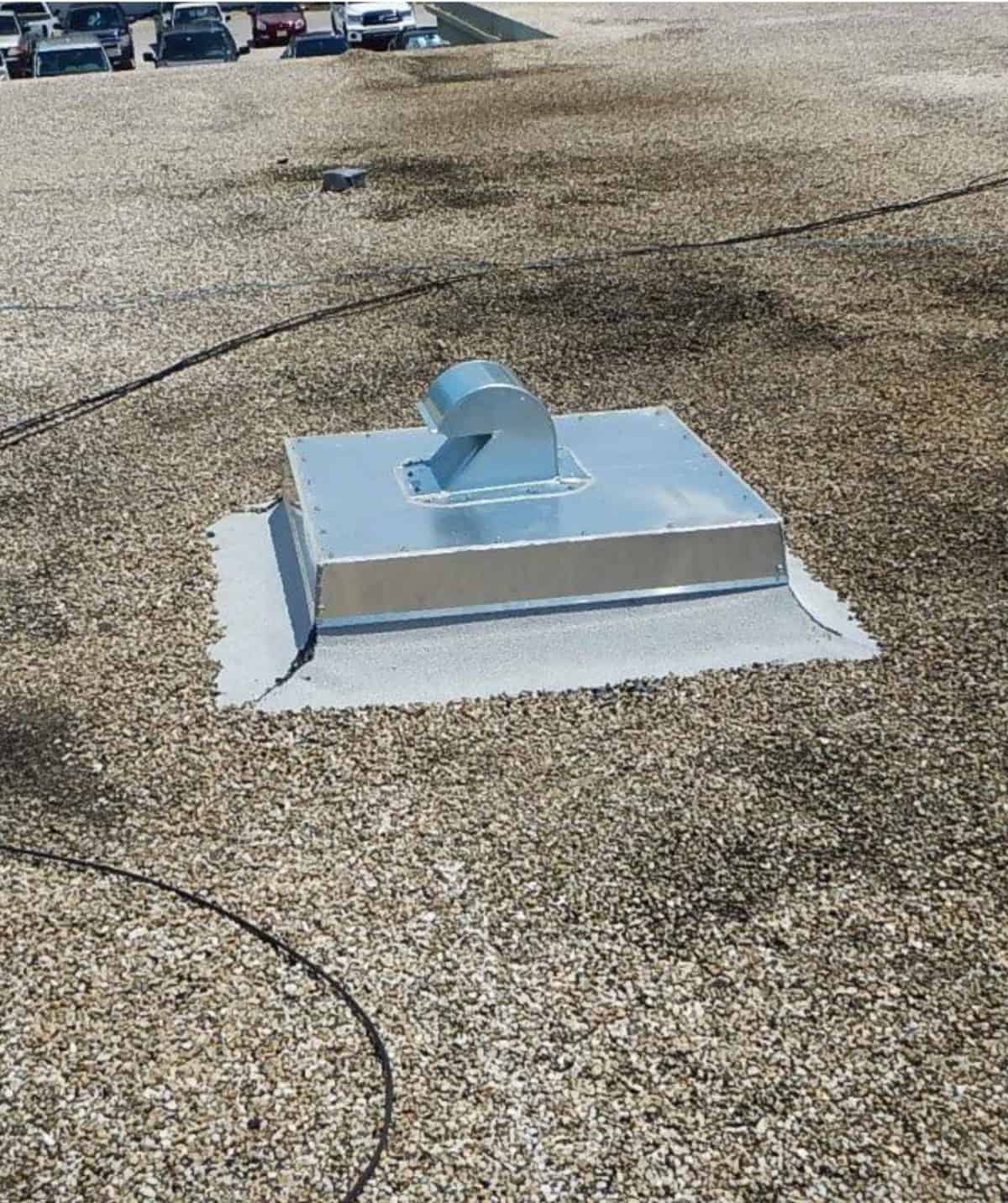 A new vent installed on a commercial building.