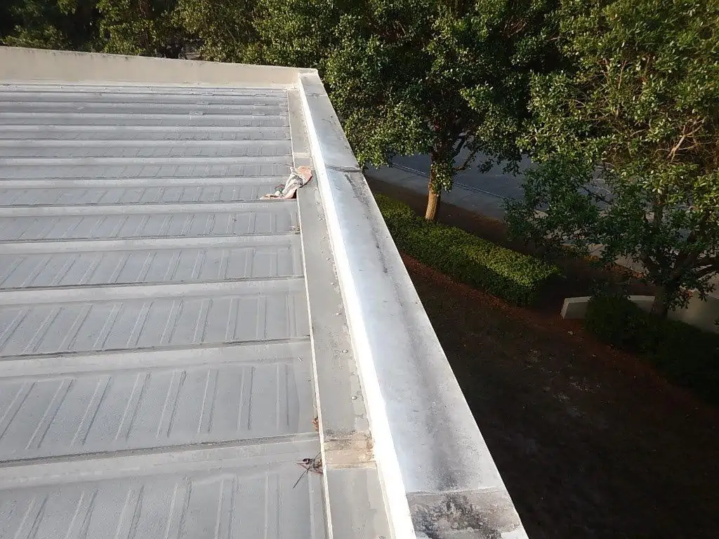 Before photo of a roof line repair.